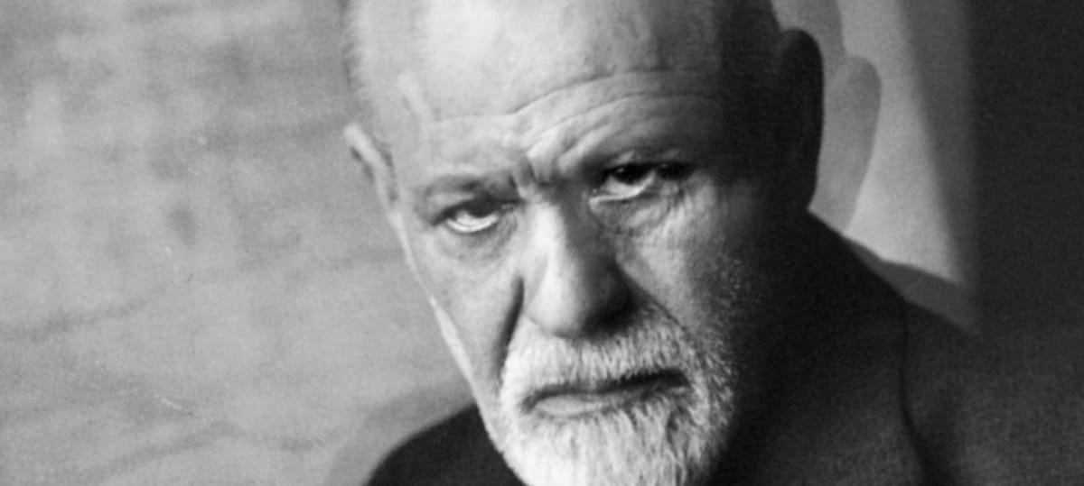 An edited crop of a photographic portrait of Freud, layered and tilted over itself. Source: https://commons.wikimedia.org/wiki/File:Sigmund_Freud_1926.jpg